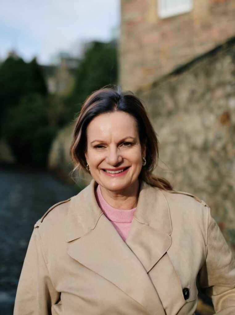 Founder of ADHD Coaching Room walking outdoors