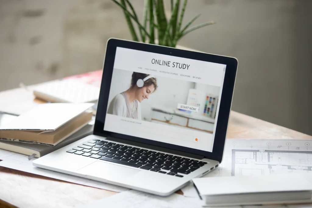 Laptop open on a desk, representing online ADHD coaching and support